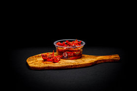 Half zongedroogde tomaat