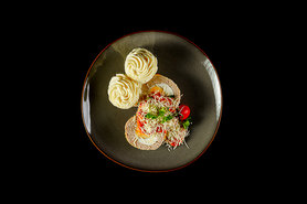 Vogelnestjes in tomatensaus